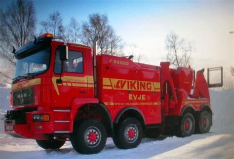 Heavy duty trucks for towing rvs. MAN - TOW | Heavy duty trucks, Tow truck, Towing