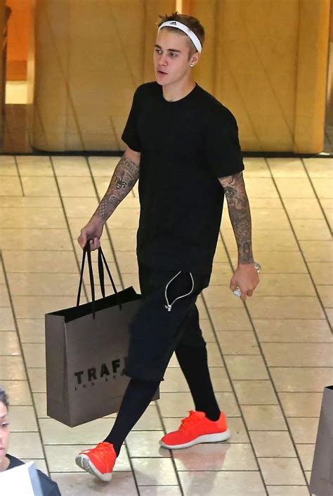 Pop Singer Justin Bieber And His Crew Seen Shopping In La Irish