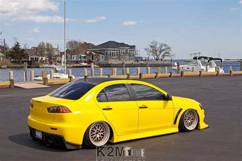 Yellow Sedan Car Yellow Cars Mitsubishi Lancer Evo X Harbor Hd