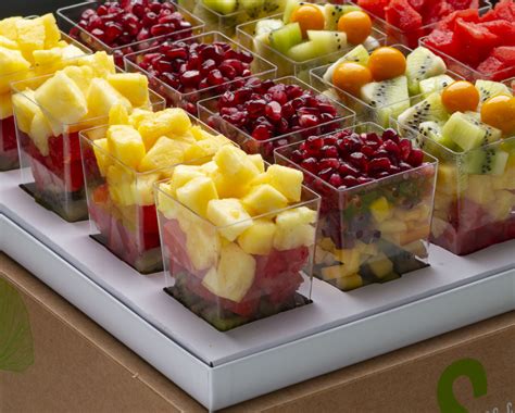 Carefully peel off paper cases. Tropical Fruit Cups - Soho Platters