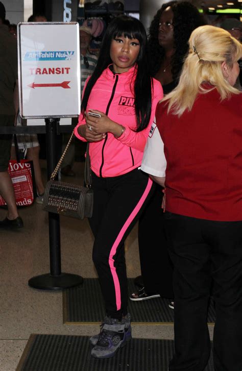 Nicki Minaj Seen In Hot Pink Track Arrives At Lax Airport Celeb Donut