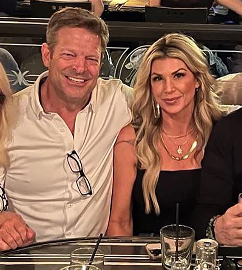 alexis bellino kisses john janssen as they pose for photos in new pda packed video