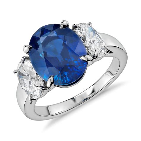 Oval Sapphire And Diamond Three Stone Ring In Platinum 501 Ct Center