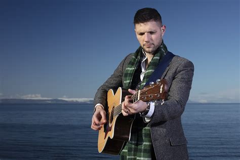 Musician Colm Keegan Wearing The Rosemarkie Waistcoat And A Woven Scarf