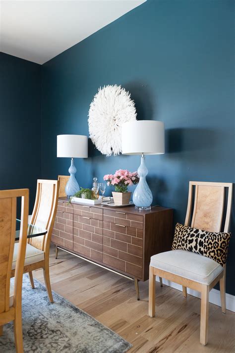 Now, you'll often find or choose to use african juju hat wall art as a focal point above beds, couches, or mantels. How to Use a Juju Hat in Home Decor -1 - CC & Mike
