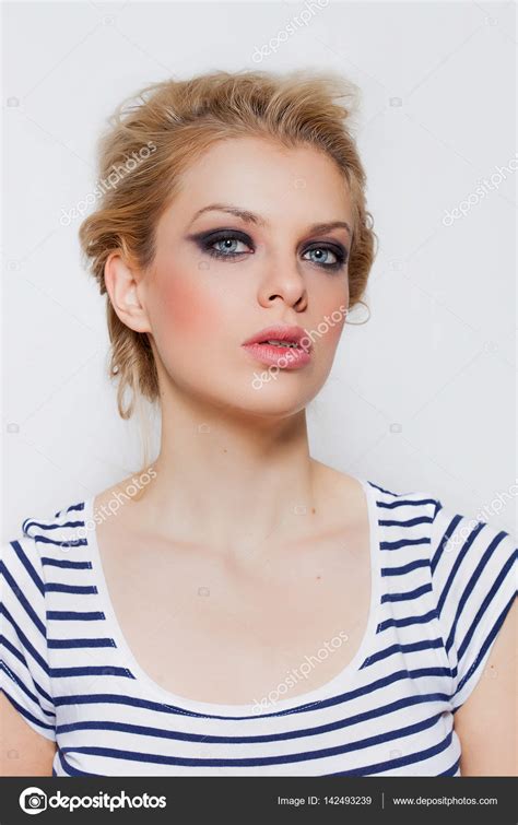 Pretty Blonde Girl Portrait With Smokey Eyes Wearing Striped T Shirt