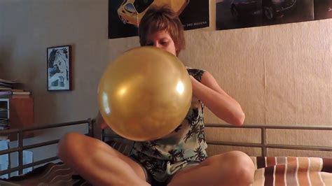 Girl Blows Up A Pretty Golden Balloon Until It Pops Funny Clip Youtube