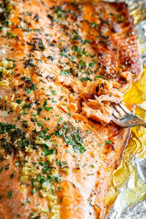 This Baked Salmon In Foil With Garlic Rosemary And Thyme Is Easy And Out Of This World Deliciou