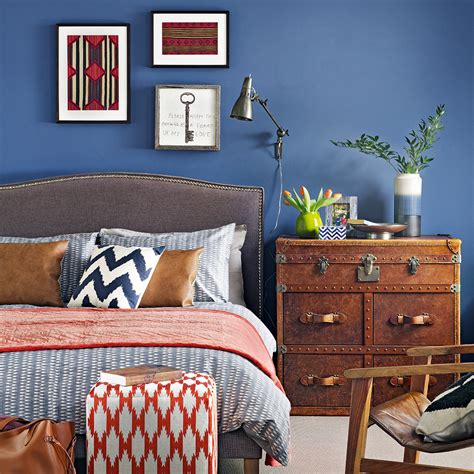 The bed frame is black with a blue comforter. Blue bedroom ideas - see how shades from teal to navy can ...