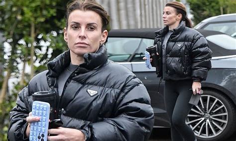 Coleen Rooney Rocks A Sporty Figure In Skin Tight Leggings And Prada Jacket As She Steps Out