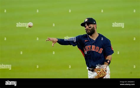 Houston Astros Second Baseman Jose Altuve Throws To First After