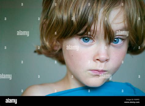 Sweden Vastergotland Lerum Portrait Of Blue Eyed Boy 8 9 Stock