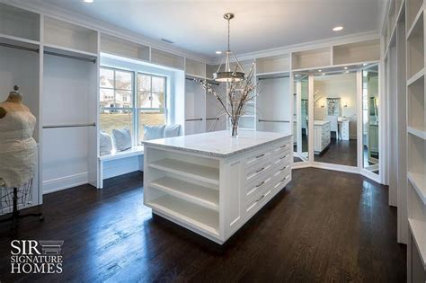 Gorgeous Boutique Style Large Walk In Closet Boasts A Gorgeous White