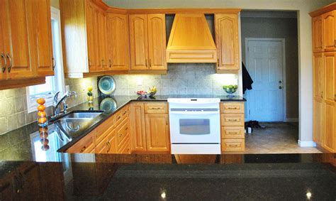 Cabinets alongside black granite may seem. Uba Tuba Granite Countertops (Pictures, Cost, Pros & Cons)