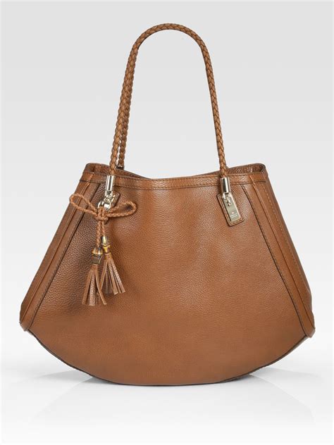 The abbey tote bag features a leather body Gucci Bella Medium Tote Bag in Brown (camel) | Lyst