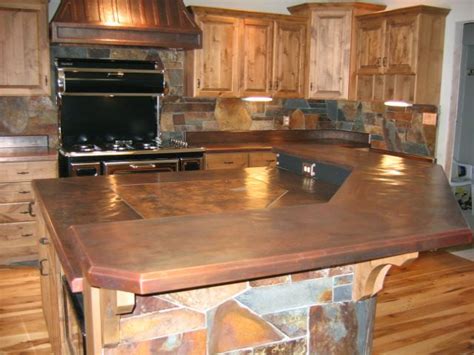 A Kitchen With An Island Made Out Of Wood