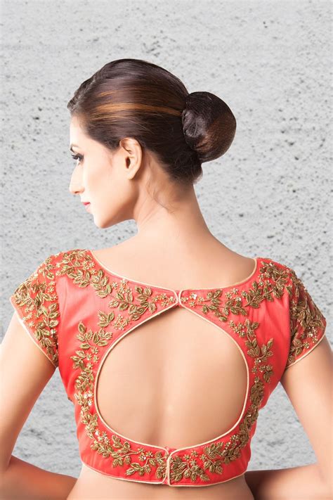 15 evergreen and trendy saree blouse back designs. Strawberry pink blouse adorn heavy zardozi work blouse. # ...