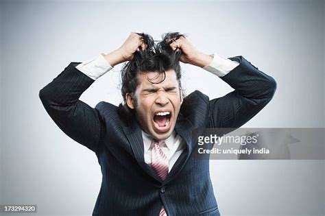 Man Pulling His Hair Out Photos And Premium High Res Pictures Getty