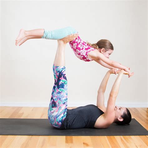 A lot of yoga poses with a partner revolve around creating balance, whether the pose requires one person to float on top of the other, or for two yogis to counterbalance one another. Mommy and Me Yoga Poses | POPSUGAR Fitness