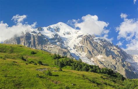 The Snow Capped Peaks Of The Caucasus Mountains Stock Photo Image Of