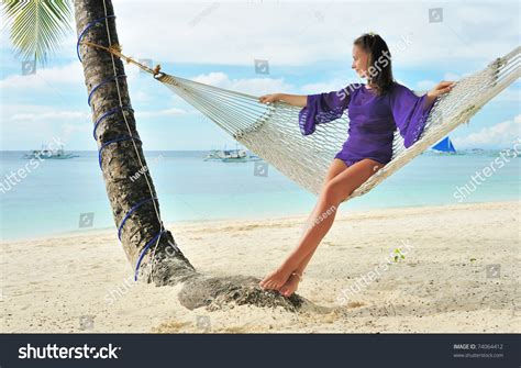 Woman In Hammock On Tropical Beach Stock Photo 74064412 Shutterstock