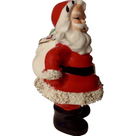 Vintage Santa Claus Ceramic Figurine With Bag Of Toys And Right Arm On Hip