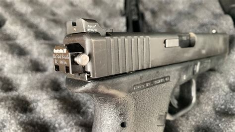 Atf Sees Rise In Quarter Sized Switch That Turns Handguns Into Machine Guns