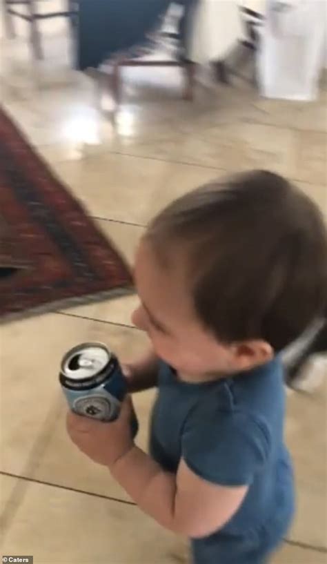 Cheeky Toddler Runs Off With His Dads Beer And Refuses To Give It Back