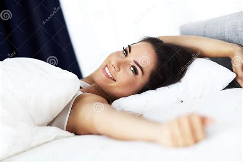 Young Beautiful Woman Waking Up In Her Bed Fully Rested Stock Image Image Of Sensual House