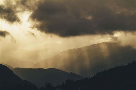 Nature Photo Of Crepuscular Rays On Mountains Light Image Free Photo