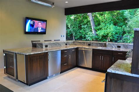 Many people will have an architect, designer, cabinet shop, and builder plan your. How to Build a Perfect Outdoor Kitchen: Rachael Abrams ...