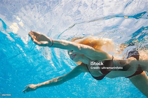 Underwater Pool Party Woman Swimming Relaxing In Swimming Pool Stock