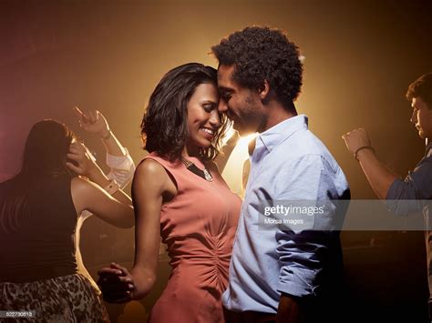 Romantic Couple Dancing At Nightclub Photo Getty Images