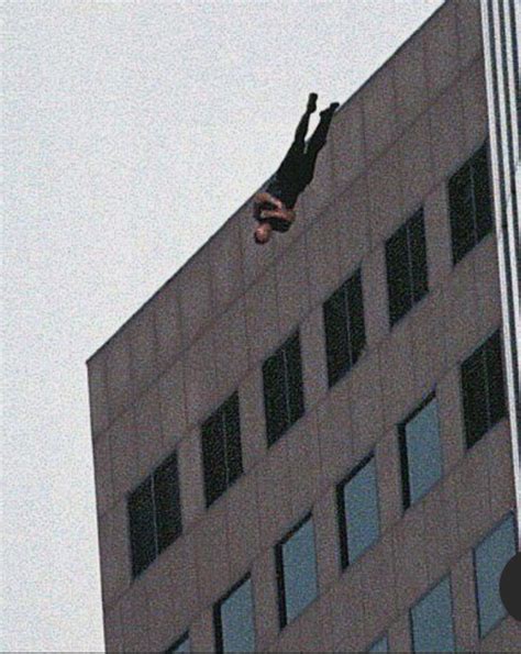 A Man Moments After Leaping From His 94th Floor Office From The South