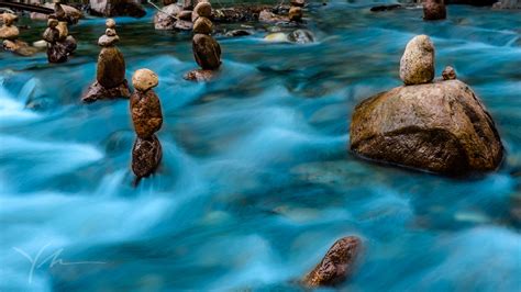 Long Exposure Of Balanced Rock Formations Along The River In Big Sur