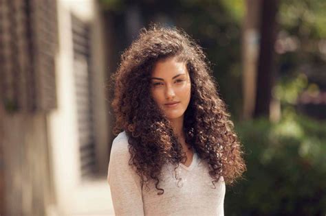 If you really like length, just keep growing out that hair. 16 Easy and Modern Hairstyles for Thick Curly Hair