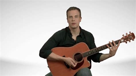 Many guitar players can't seem to agree on the correct way of holding the pick. How To Hold An Acoustic Guitar - Guitar Lessons - YouTube