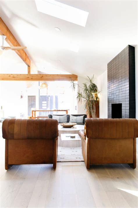 I'm thinking block including flue gatherer with brick around it? Black Brick Fireplace for Mid-Century Modern Home | Brick ...