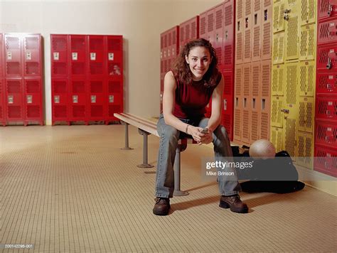 Teenage Girl On Bench In Locker Room Portrait Photo Getty Images