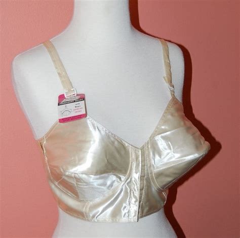 reserved vintage 1950s new old stock ivory satin bullet bra