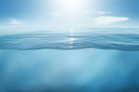 Blue Sea Or Ocean Water Surface And Underwater With Sunny And Cloudy