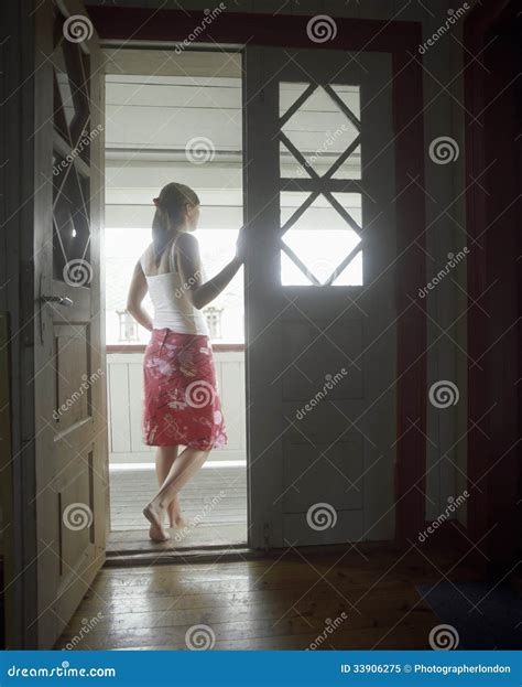 Woman Standing In Open Door Stock Image Image Of Person Interior