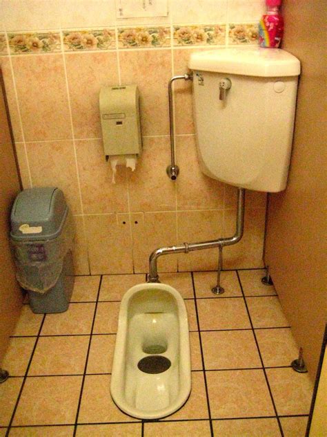 Squat Toilet In Japan Most I Saw Didnt Have A Tank Like That But And Some Were Basically