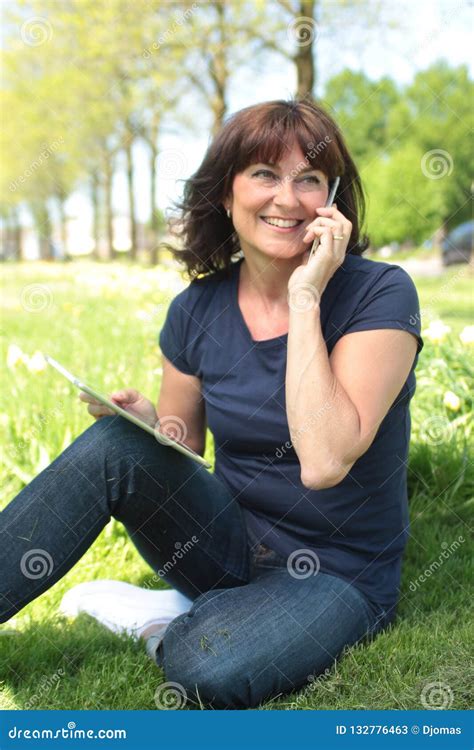 beautiful happy mature caucasian woman outside in the park stock image image of health blonde