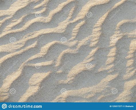 Textura De Las Ondas De Arena En La Playa O En El Desierto Las