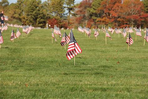 Volunteers Plant Thousands Of Flags At National Cemetery For Flags For Vets Ceremony Bourne