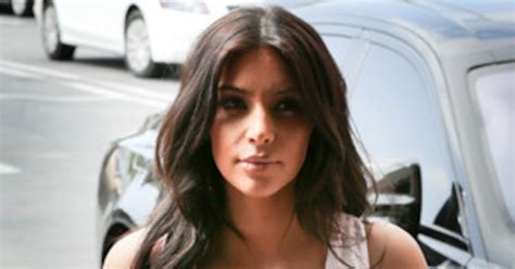 kim kardashian steps out in boob baring dress after vogue cover announcement—see the sexy pic