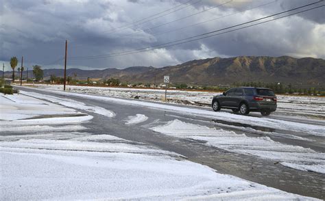 Snow Like Hail In Phoenix Area Desert Caps Days Of Storms Ap News