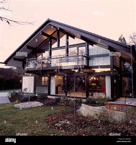 Modern Chalet With Balcony And Doors Open Stock Photo Alamy