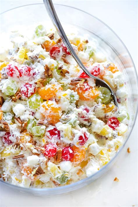 I have a few potlucks coming up, and my friends are all very excited to know what i'm bringing to the party! My Favorite Ambrosia Salad | foodiecrush.com | Ambrosia salad